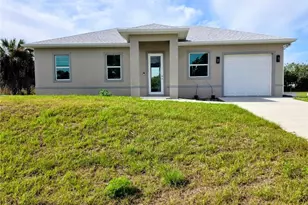 402 Harrison Dr, Lehigh Acres, FL 33936 - Photo 1