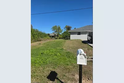 243 Meadow Rd, Lehigh Acres, FL 33973 - Photo 1