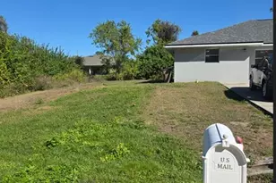 243 Meadow Rd, Lehigh Acres, FL 33973 - Photo 1