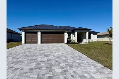 102 NE 8th Pl, Cape Coral, FL 33993 - Photo 1