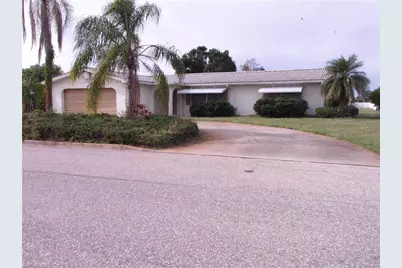 242 S Lake Dr, Lehigh Acres, FL 33936 - Photo 1