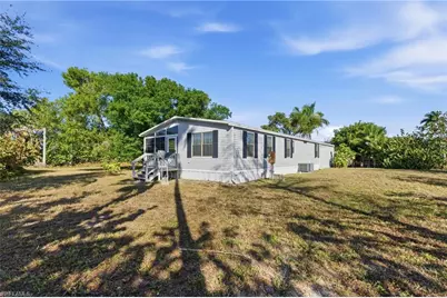 11250 Stringfellow Rd, Bokeelia, FL 33922 - Photo 1