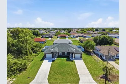 723 Ivan Ave S, Lehigh Acres, FL 33973 - Photo 1