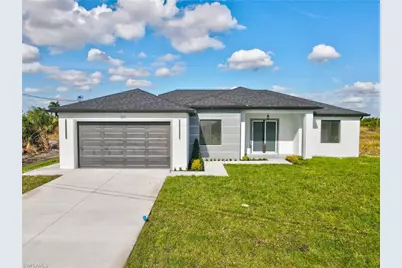 321 Peerless St, Lehigh Acres, FL 33974 - Photo 1