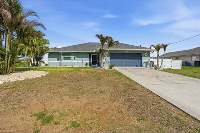 906 Venice Ave N, Lehigh Acres, FL 33971 - Photo 1