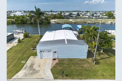 3864 Royal Palm Dr, Saint James City, FL 33956 - Photo 1