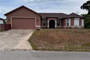 1154 Damen St E, Lehigh Acres, FL 33974 - Photo 1