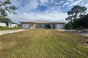 851 Eisenhower Blvd, Lehigh Acres, FL 33974 - Photo 1