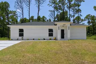 1120 Ravenswood St E, Lehigh Acres, FL 33974 - Photo 1