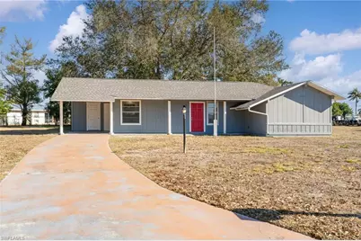 100 Contee Dr, Lehigh Acres, FL 33936 - Photo 1