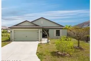 747 Center Lake St, Lehigh Acres, FL 33974 - Photo 1