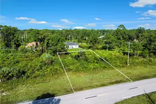 730 Columbus Blvd S, Lehigh Acres, FL 33974 - Photo 1