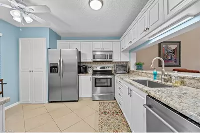 3685 Amberly Cir #D303, Naples, FL 34112 - Photo 1