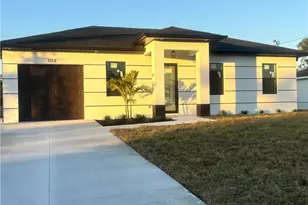 1115 Cumming St E, Lehigh Acres, FL 33974 - Photo 1