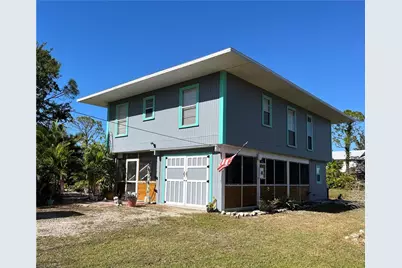 8595 Redwood Dr, Saint James City, FL 33956 - Photo 1