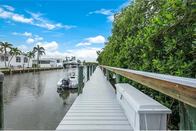 3072 Sandpiper Bay Cir #M203, Naples, FL 34112 - Photo 1