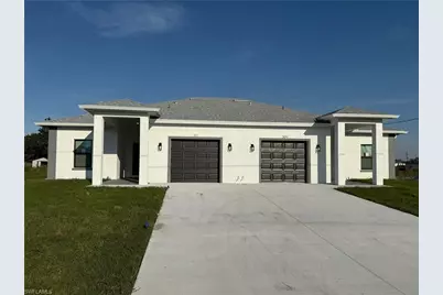309-311 Homer Ave S, Lehigh Acres, FL 33973 - Photo 1
