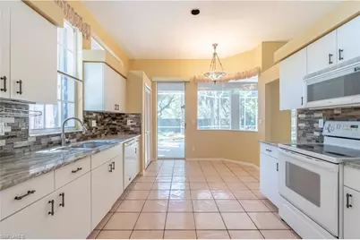 2656 River Reach Dr, Naples, FL 34104 - Photo 1