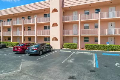 180 Turtle Lake Ct #105, Naples, FL 34105 - Photo 1