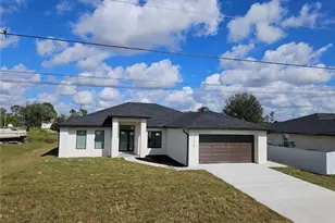 154 Patio St, Lehigh Acres, FL 33974 - Photo 1