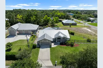 745 David Laird Ln, Lehigh Acres, FL 33974 - Photo 1