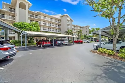 340 Horse Creek Dr #202, Naples, FL 34110 - Photo 1