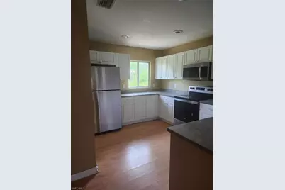 647 Dubarry Ave S, Lehigh Acres, FL 33974 - Photo 1