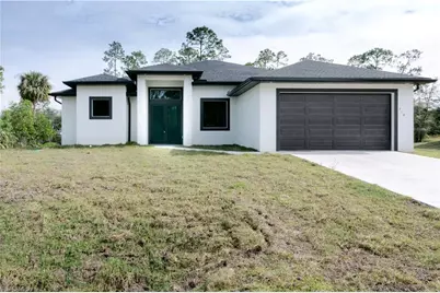 718 Calvin Ave, Lehigh Acres, FL 33972 - Photo 1