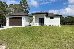 615 Addison St E, Lehigh Acres, FL 33974 - Photo 1