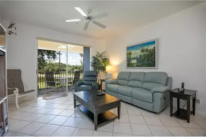 3964 Bishopwood Ct E #1-202, Naples, FL 34114 - Photo 1