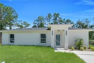 1132 Ravenswood St E, Lehigh Acres, FL 33974 - Photo 1
