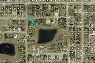 740 Chattman St E, Lehigh Acres, FL 33974 - Photo 1