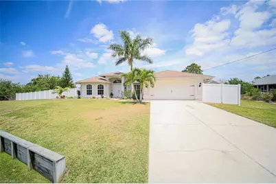 823 Portland St E, Lehigh Acres, FL 33974 - Photo 1