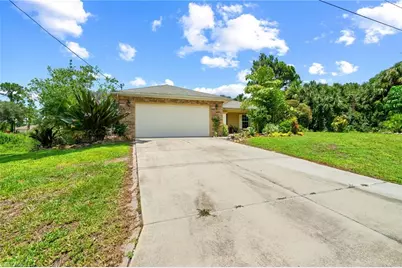 873 Spaulding St E, Lehigh Acres, FL 33974 - Photo 1