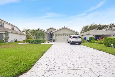 2329 Heritage Greens Dr, Naples, FL 34119 - Photo 1