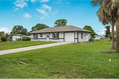 803 Monroe Dr, Lehigh Acres, FL 33936 - Photo 1