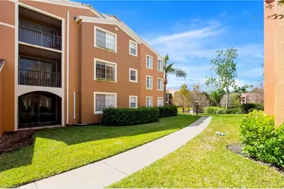 1225 Reserve Way #102, Naples, FL 34105 - Photo 1