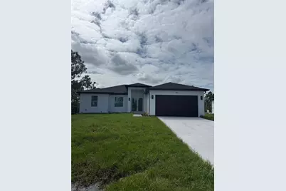 852 Amigo St E, Lehigh Acres, FL 33974 - Photo 1