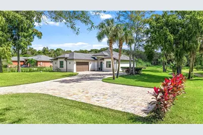 110 6th St NE, Naples, FL 34120 - Photo 1