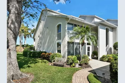 457 Country Hollow Ct #A201, Naples, FL 34104 - Photo 1
