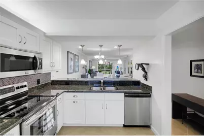 2462 Hidden Lake Dr #201, Naples, FL 34112 - Photo 1