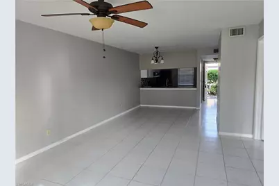 2660 Kings Lake Blvd #7-103, Naples, FL 34112 - Photo 1