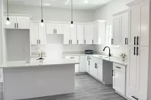 1024 Bagget St E, Lehigh Acres, FL 33974 - Photo 1