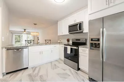 3491 County Barn Rd #E102, Naples, FL 34112 - Photo 1