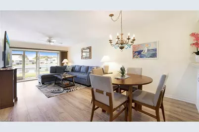 905 New Waterford Dr #101, Naples, FL 34104 - Photo 1