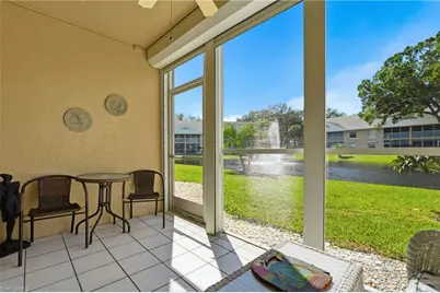 144 Pebble Shores Dr #103, Naples, FL 34110 - Photo 1