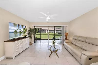 236 Pebble Beach Cir #A102, Naples, FL 34113 - Photo 1