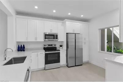 700 Saratoga Cir #B-101, Naples, FL 34104 - Photo 1