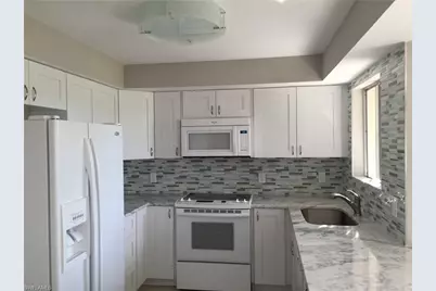 3655 Boca Ciega Dr #102, Naples, FL 34112 - Photo 1