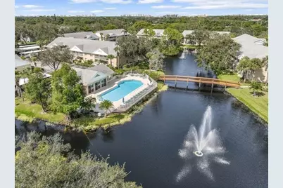 174 Pebble Shores Dr S #204, Naples, FL 34110 - Photo 1